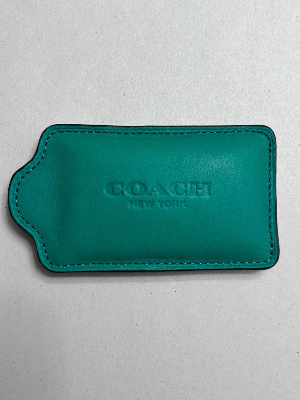Coach Green paperweight hang tag